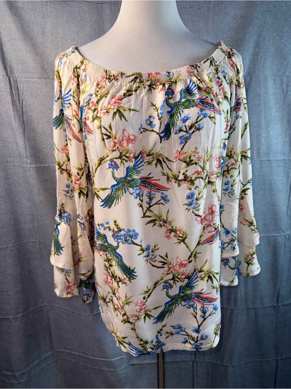 1349-Solitaire Cream Off-Shoulder Blouse with Blue & Green Parrot Print